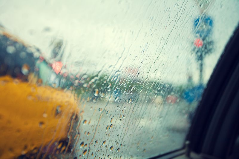 Storm Water Run Off Image of Car With Rain Drops